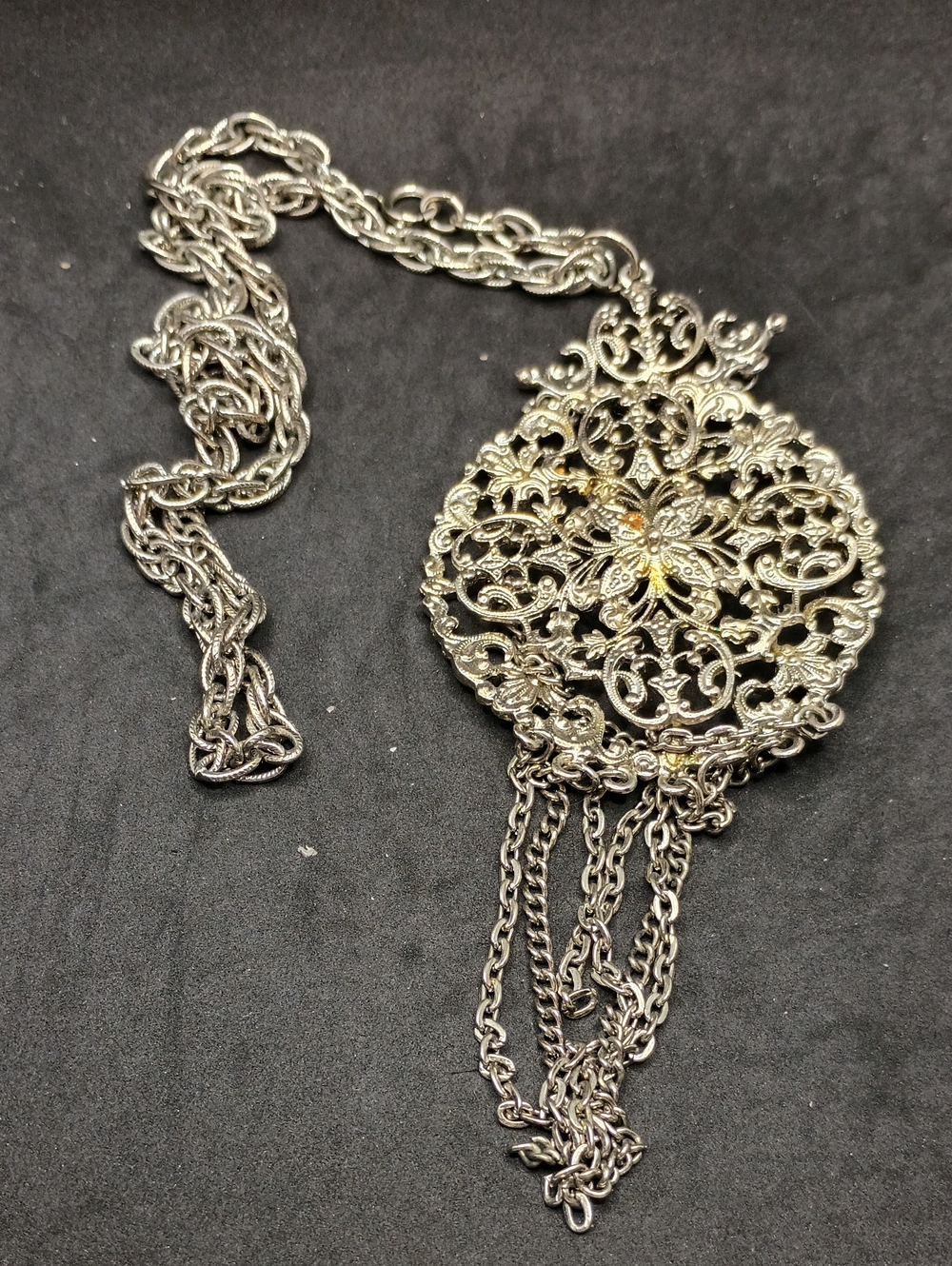 Ornate Filigree Silver-Tone Pendant Necklace with Chain Tassels